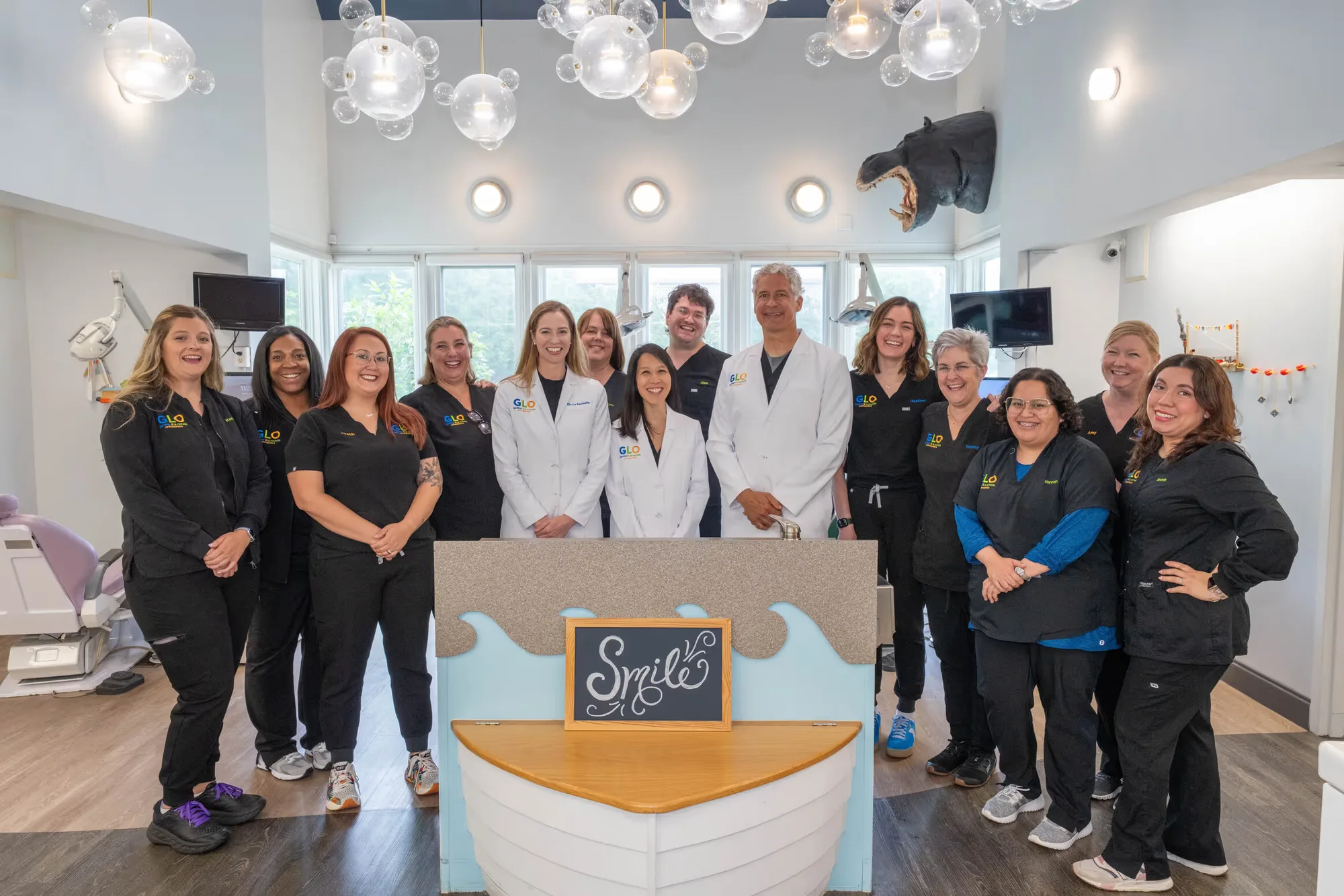 The Gardner & La Rochelle Orthodontics team together in the office