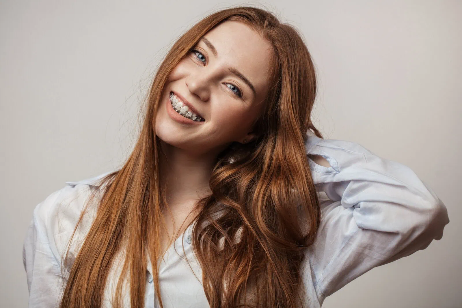 Smiling teen with braces